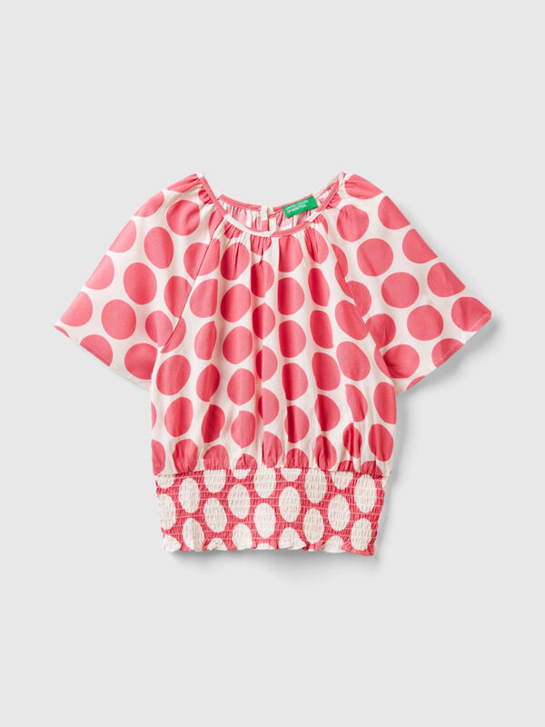 Fließende Bluse mit Punktemuster