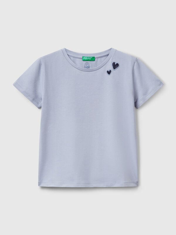 T-Shirt mit ausgeschnittenem Motiv Mädchen