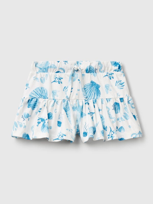 Weiße Shorts mit blauen Muscheln Mädchen