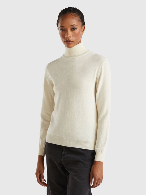 Cremefarbener Rollkragenpullover aus Merinowolle Damen