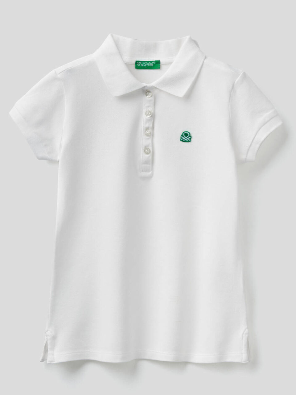 Polo mit Aufnäher in Form des Logos image number 1
