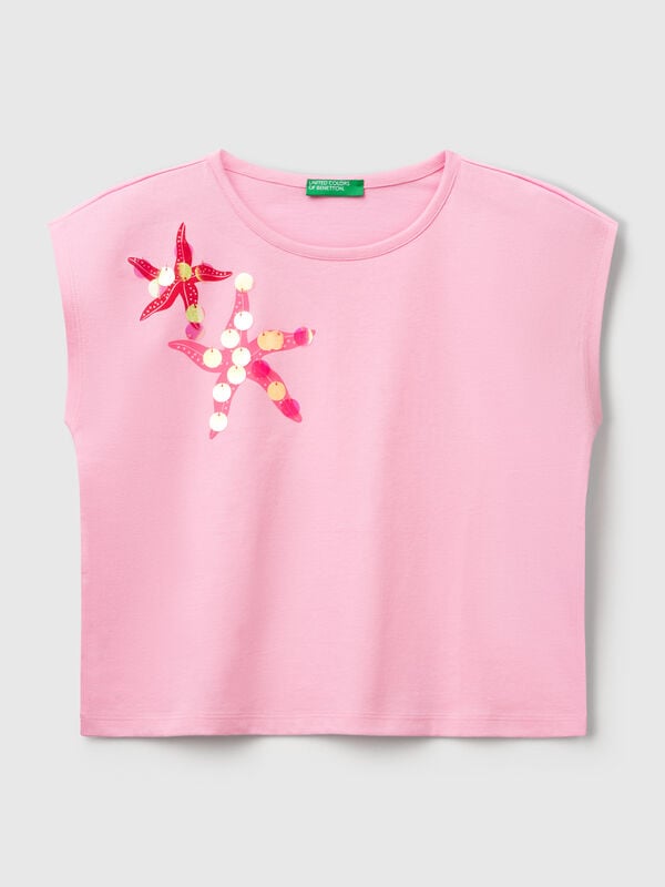 T-Shirt mit Aufdruck und Pailletten Mädchen